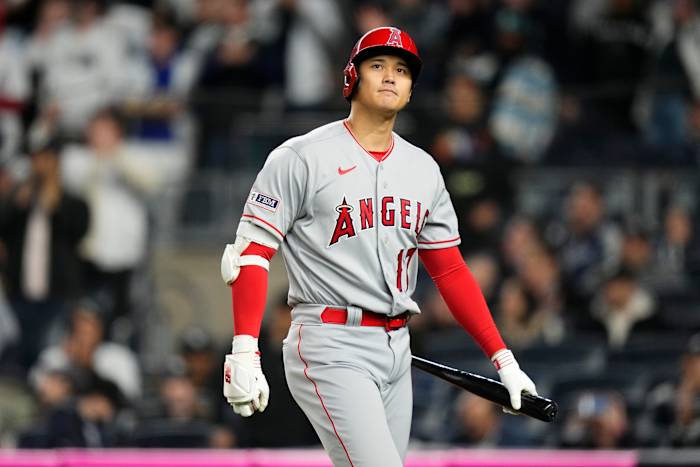 Shohei Ohtani reacts after striking out during the seventh inning of a game against the Yankees in New York.
